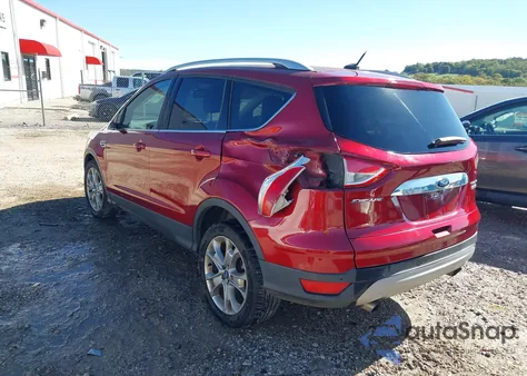 2014 Ford Escape Titanium z USA, uszkodzony, nr VIN 1FMCU0J99EUD79087